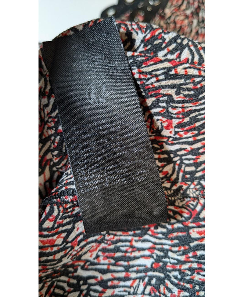 Élégance responsable avec cette pièce vintage 560014 en parfait état, sélectionnée par Once Again.