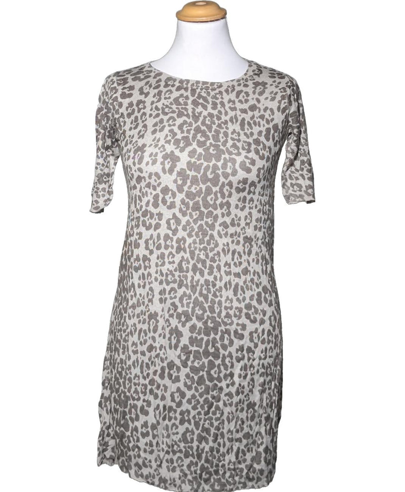 La garantie Once Again : 560053 vêtements d'occasion de marque en état irréprochable.
