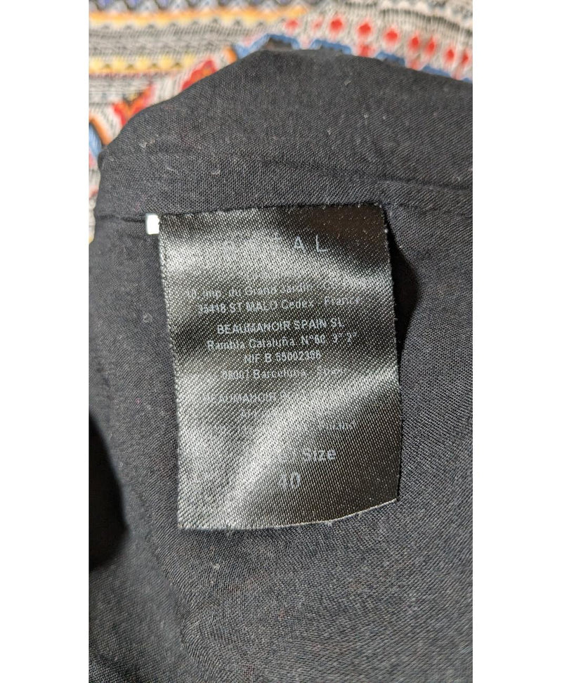 Élégance responsable avec cette pièce vintage 560525 en parfait état, sélectionnée par Once Again.