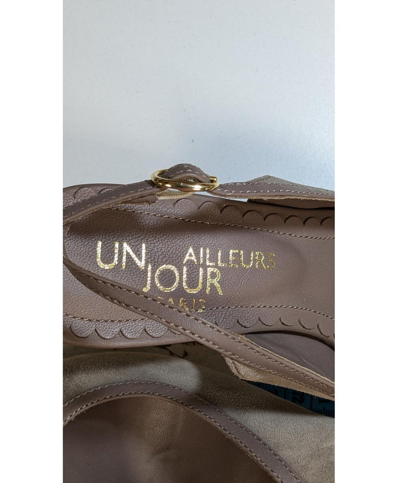 La garantie Once Again : 560771 vêtements d'occasion de marque en état irréprochable.