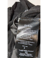 La garantie Once Again : 560983 vêtements d'occasion de marque en état irréprochable.