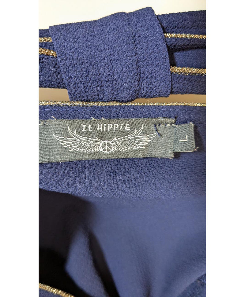 La garantie Once Again : 562013 vêtements d'occasion de marque en état irréprochable.