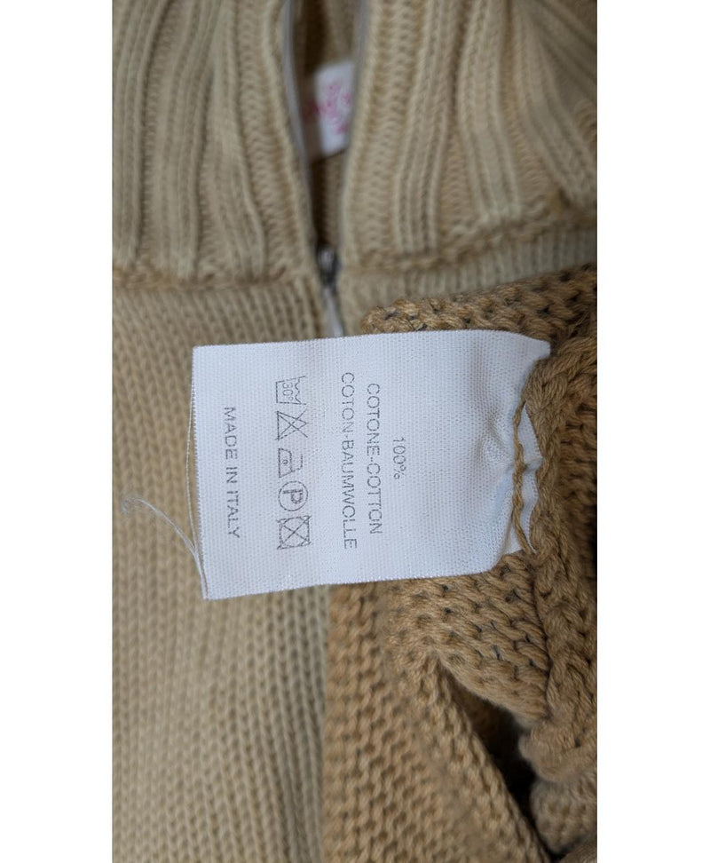 La garantie Once Again : 562032 vêtements d'occasion de marque en état irréprochable.
