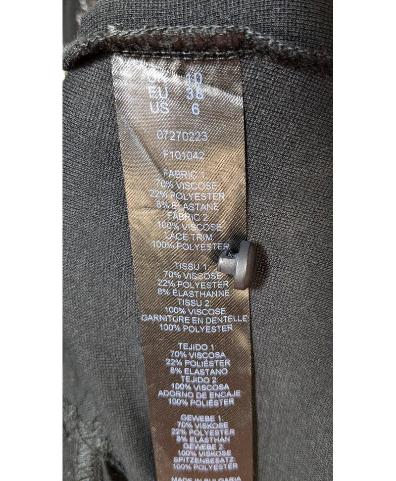 562053 Once Again, la référence de la friperie en ligne pour des achats de vêtements d'occasion sans souci et en état parfait.