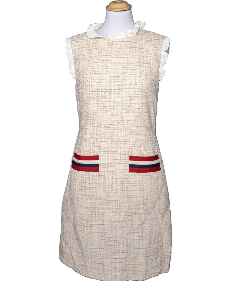 La garantie Once Again : 562062 vêtements d'occasion de marque en état irréprochable.