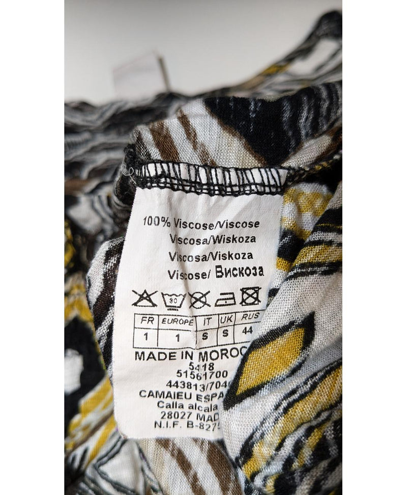 Mode durable et rapide avec Once Again : article 562077 de seconde main en très bon état.