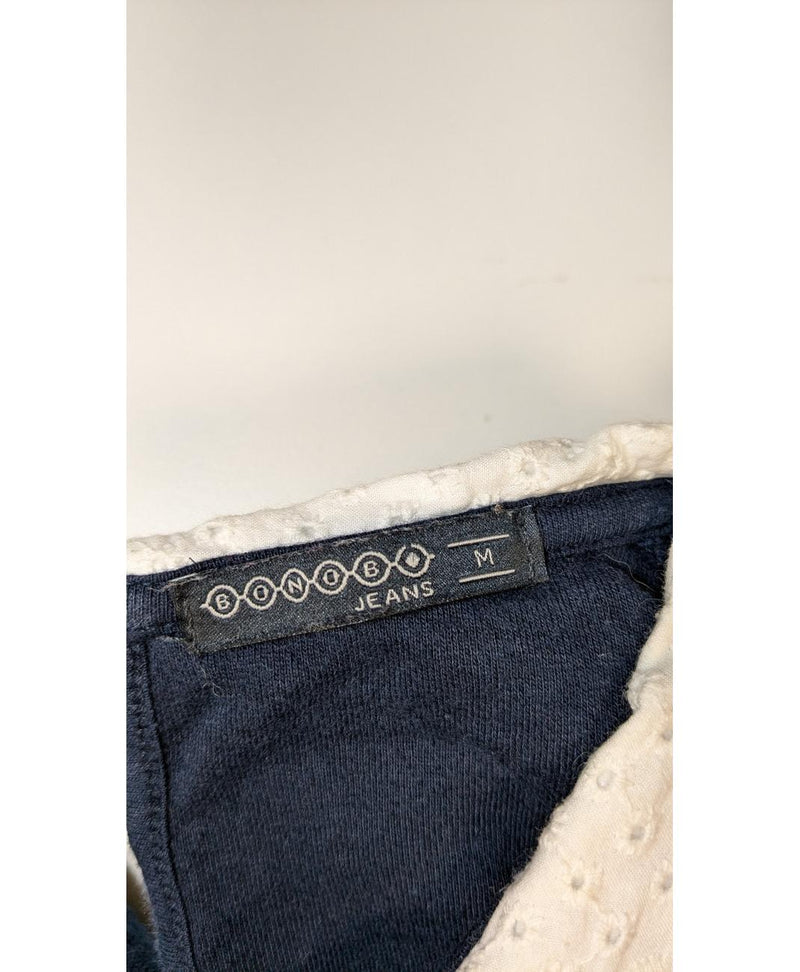 La garantie Once Again : 562102 vêtements d'occasion de marque en état irréprochable.