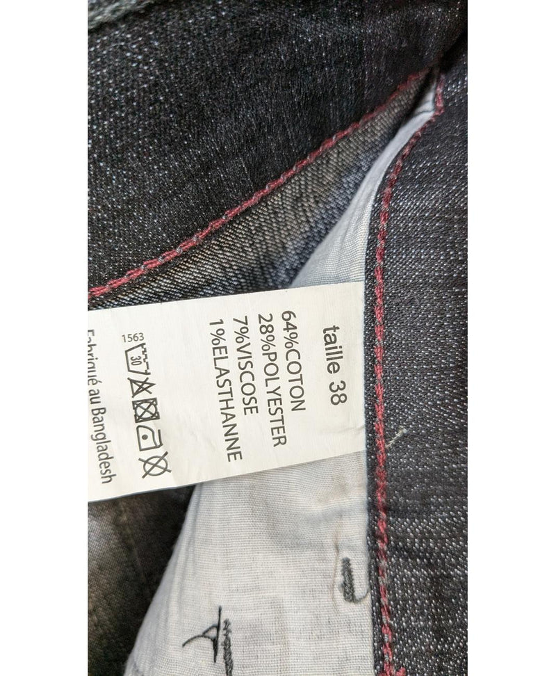 La garantie Once Again : 562107 vêtements d'occasion de marque en état irréprochable.