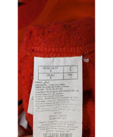 La garantie Once Again : 562112 vêtements d'occasion de marque en état irréprochable.