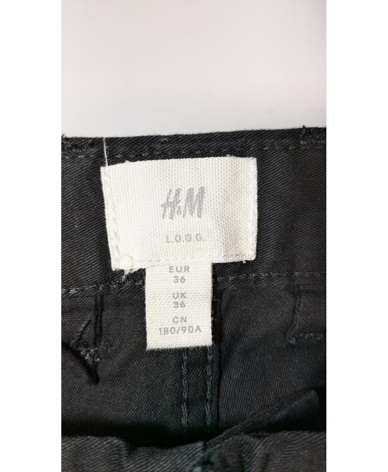 La garantie Once Again : 562116 vêtements d'occasion de marque en état irréprochable.