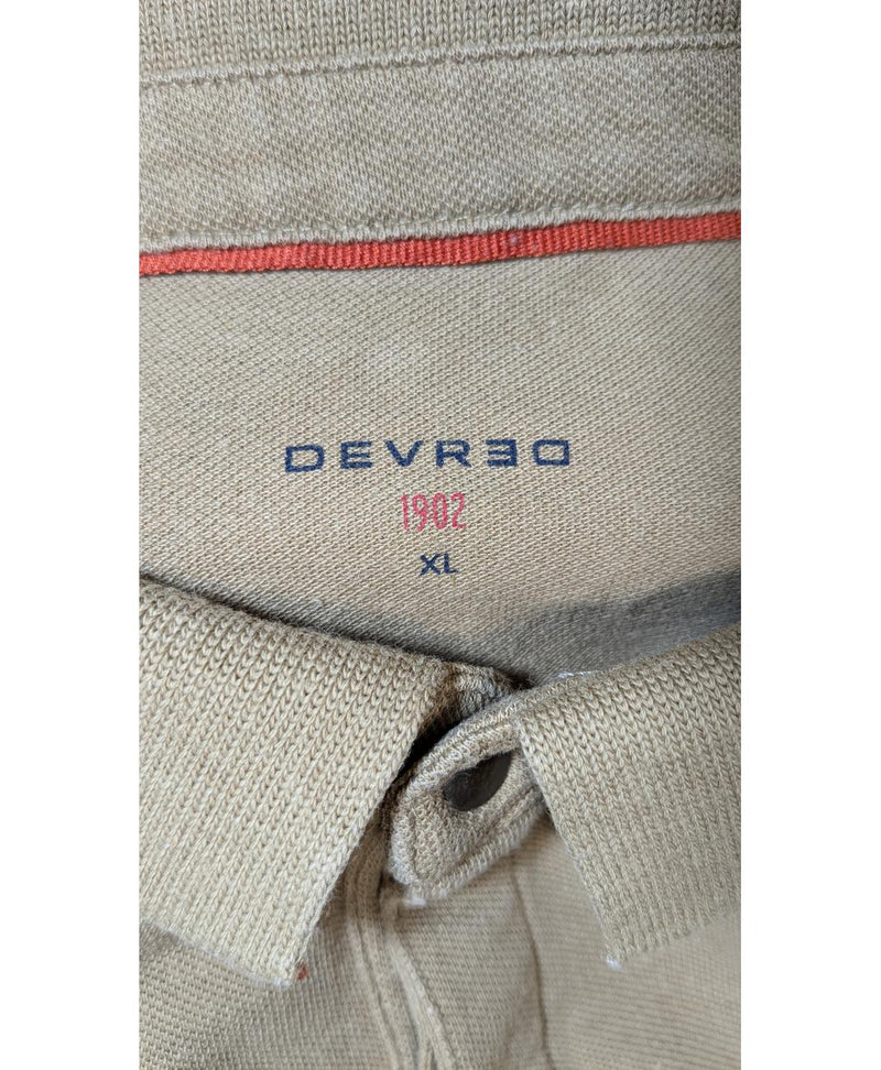 La garantie Once Again : 562124 vêtements d'occasion de marque en état irréprochable.