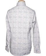 La garantie Once Again : 562128 vêtements d'occasion de marque en état irréprochable.