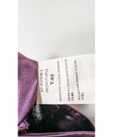 La garantie Once Again : 564428 vêtements d'occasion de marque en état irréprochable.