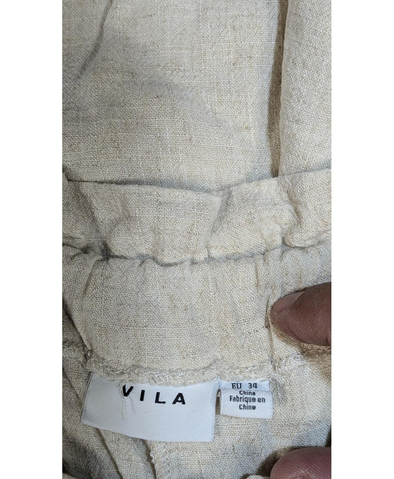 566266 Once Again, la référence de la friperie en ligne pour des achats de vêtements d'occasion sans souci et en état parfait.