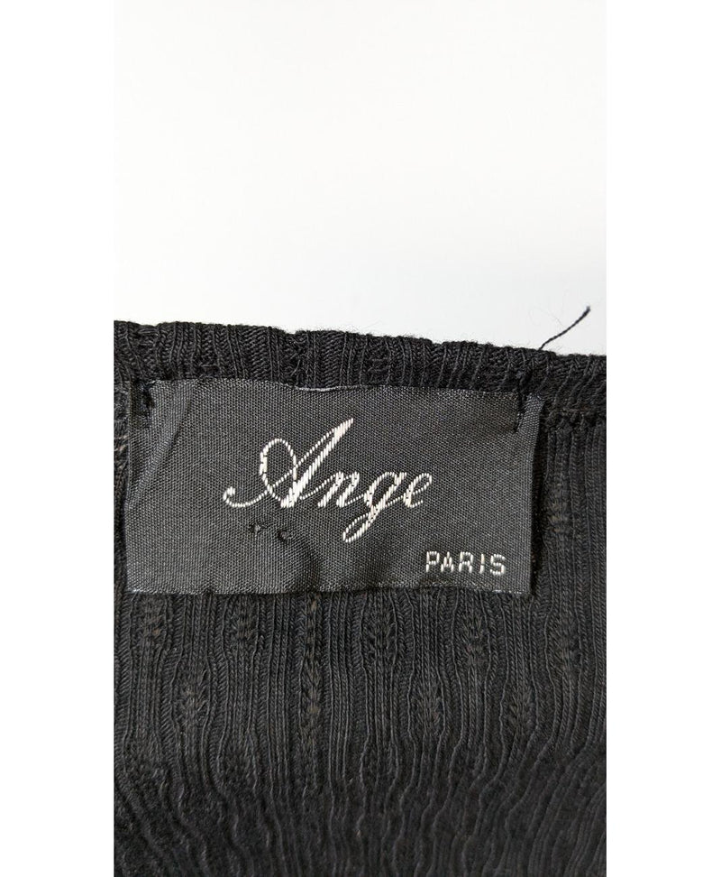 La garantie Once Again : 569753 vêtements d'occasion de marque en état irréprochable.