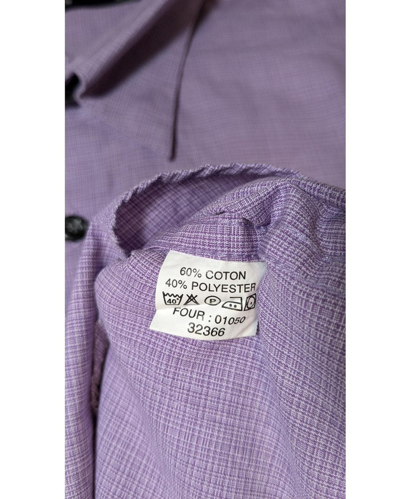 La garantie Once Again : 572988 vêtements d'occasion de marque en état irréprochable.
