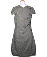 La garantie Once Again : 573543 vêtements d'occasion de marque en état irréprochable.