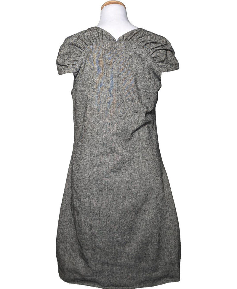 La garantie Once Again : 573543 vêtements d'occasion de marque en état irréprochable.