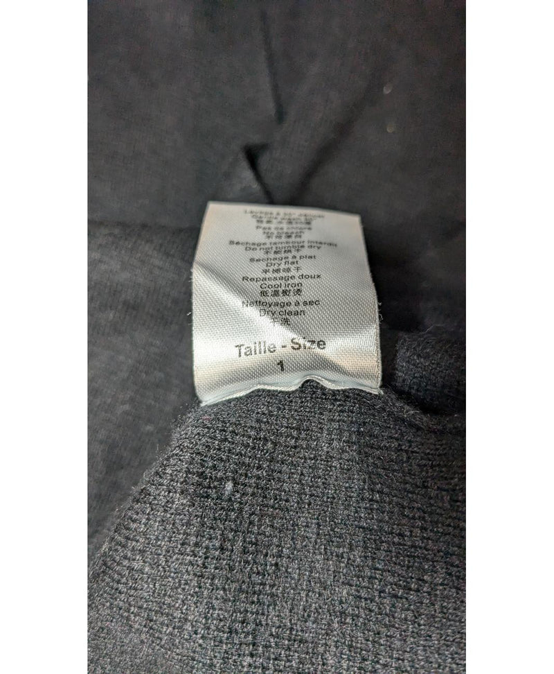 La garantie Once Again : 573643 vêtements d'occasion de marque en état irréprochable.