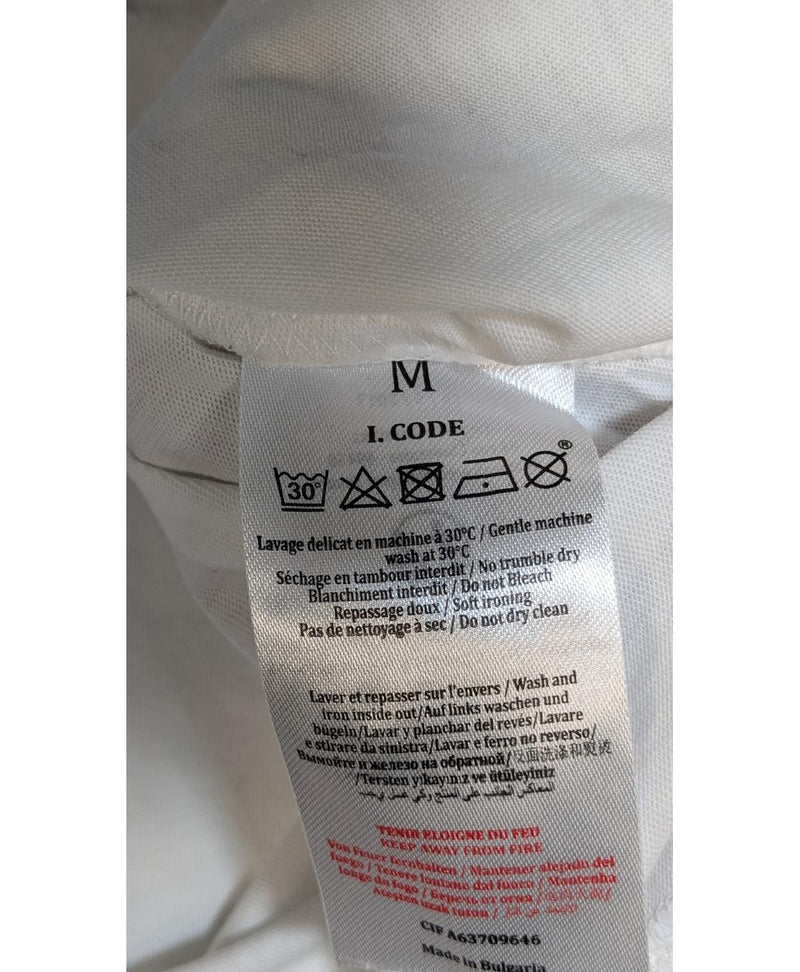 La garantie Once Again : 574937 vêtements d'occasion de marque en état irréprochable.