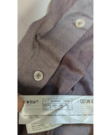 La garantie Once Again : 575697 vêtements d'occasion de marque en état irréprochable.