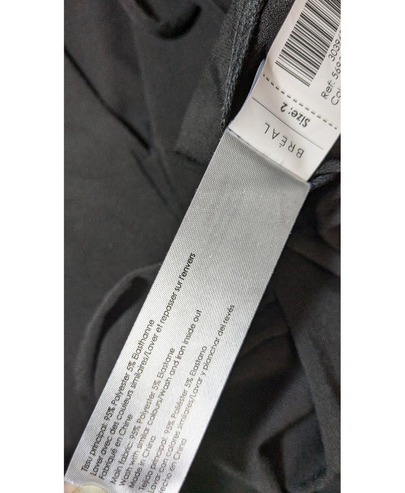 La garantie Once Again : 576669 vêtements d'occasion de marque en état irréprochable.