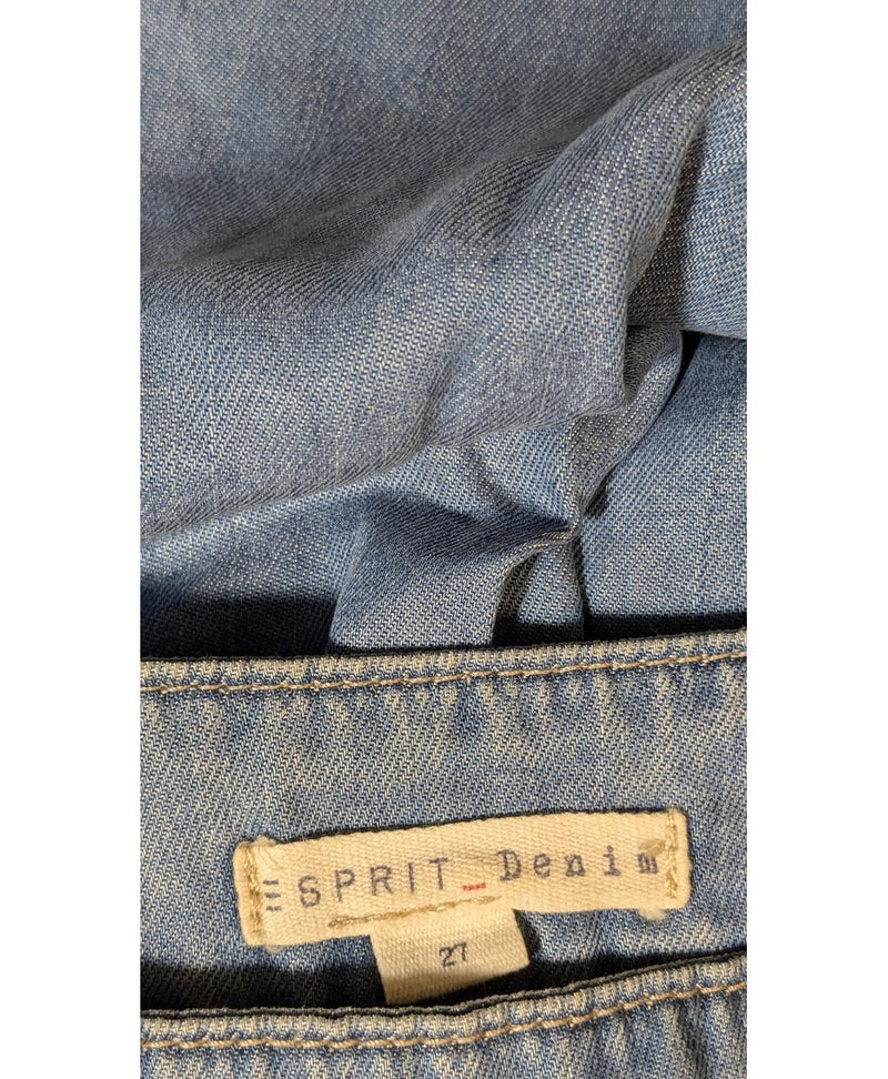 La garantie Once Again : 576985 vêtements d'occasion de marque en état irréprochable.