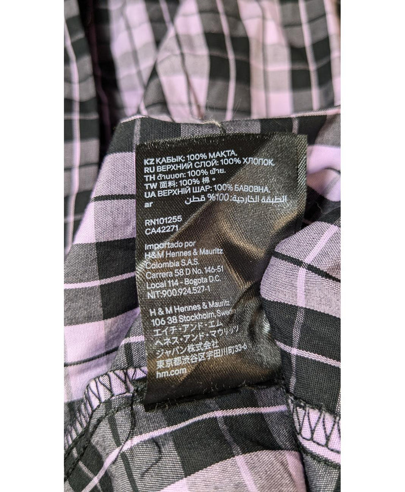 La garantie Once Again : 577559 vêtements d'occasion de marque en état irréprochable.