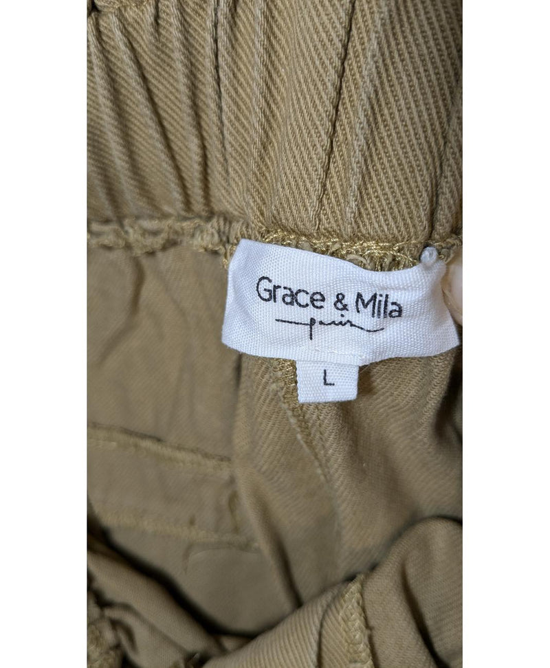 577628 Once Again, la référence de la friperie en ligne pour des achats de vêtements d'occasion sans souci et en état parfait.