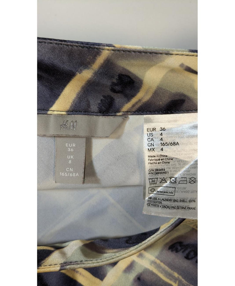 578404 Once Again, la référence de la friperie en ligne pour des achats de vêtements d'occasion sans souci et en état parfait.