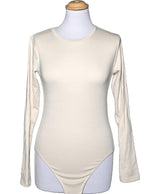 La garantie Once Again : 578867 vêtements d'occasion de marque en état irréprochable.